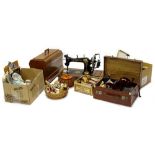 A quantity of needle work related items, to include a Jones Spool cast iron sewing machine in walnut