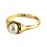 A cultured pearl dress ring, set with single tension set cultured pearl, yellow metal, marked 585,