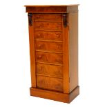 A walnut Wellington chest in Victorian style, the figured top with a moulded edge, above an