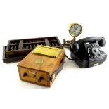 Miscellaneous decorative items, to include a teak and brass amp meter stamped Megger, two abacus,