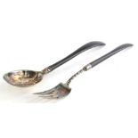 A pair of Gorham American silver plated salad servers, each with an ebonised handle, stamped Gorham,