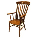 A 19thC beech and elm lathe back open armchair, with a H stretcher, stamped to the reverse F.H.
