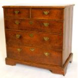 A late 18th/ early 19thC oak chest of drawers, the top with a moulded edge above two short and three