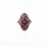 An Art Deco style ruby, diamond and sapphire cocktail ring, with arrangement of baguette cut