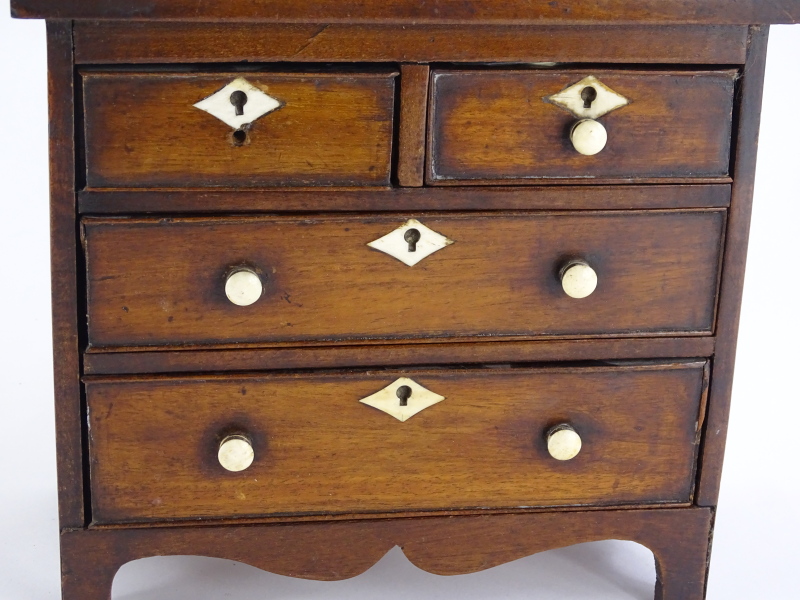 A 19thC miniature mahogany chest of drawers, with two short and three long drawers, each with bone - Image 2 of 2