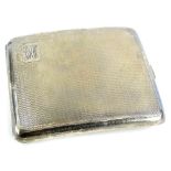 A George VI silver cigarette case, with engraved decorations and monogram, Birmingham 1951, 4½oz.