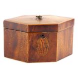 A George III mahogany and boxwood strung tea caddy, of elongated hexagonal form, the hinged lid with