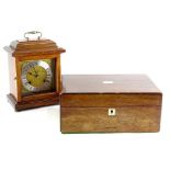 A Woodford mahogany mantel clock, on bun feet, 22cm high, and a mahogany work box.