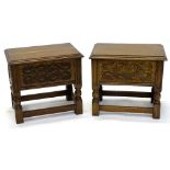 A pair of oak work boxes, each hinged lid with a moulded edge, above a carved frieze on turned