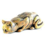 A heavy stoneware model of a Siamese type cat, unmarked, (AF), 47cm long.