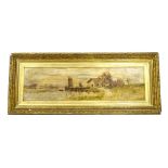 Late 19th/early 20thC School. Cottage Beside a River, oil on canvas, in gilt frame, 18cm x 70cm.