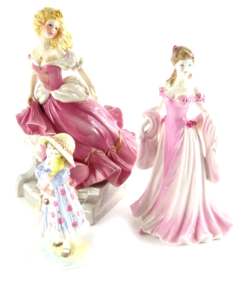 A Franklin Mint porcelain figure Cinderella, a Coalport limited edition figure Raggety Anne, and a
