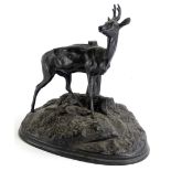 20thC School. Figure of a stag on a stylised rock and leaf and branch base, indistinctly signed,