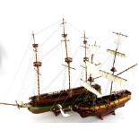 A 20thC model of the ship The Galleon La Gloire, with realistic decking and masts on a wooden stand,