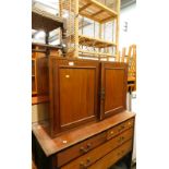 An Edwardian mahogany chest of two short and two long drawers, a mahogany cabinet later fitted