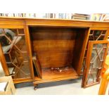 An early 20thC walnut astragal bookcase, with a pair of glazed doors, flanking another pair of