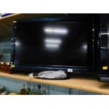 A Panasonic 31" TV, with lead and remote.