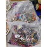Three bags of miscellaneous costume jewellery, mainly beads, to include bangles, necklaces, etc.