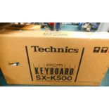 A Technics SX-K500 keyboard and stand.