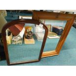 A Victorian mahogany arched wall mirror and a pine rectangular mirror (2).