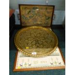 An embossed eastern brass dish, a sampler dated 1989 and an embroidered two handled galleried