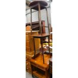 A mahogany two tier occasional table, a mahogany bedside table with under tier and wheels and