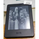An Amazon Kindle, lacking chargers or accessories.