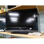 A Sony Bravia 31" TV, with lead and remote.