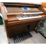 A Yamaha electric Electone AR-100 keyboard organ.