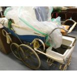 A Swan coach built pram with spoked wheels, painted in blue and white, and a Tri-ang childs pram, (