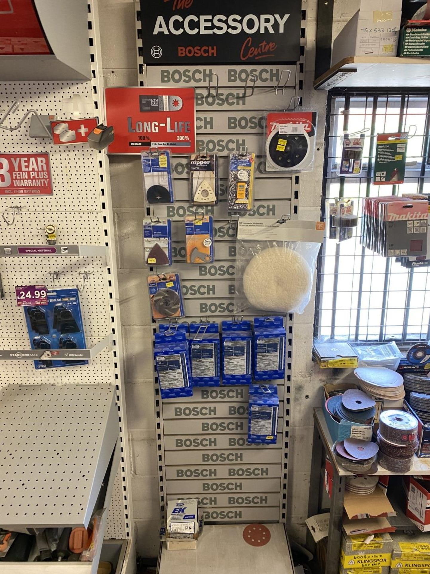 Accessory display and contents of sand paper and parts