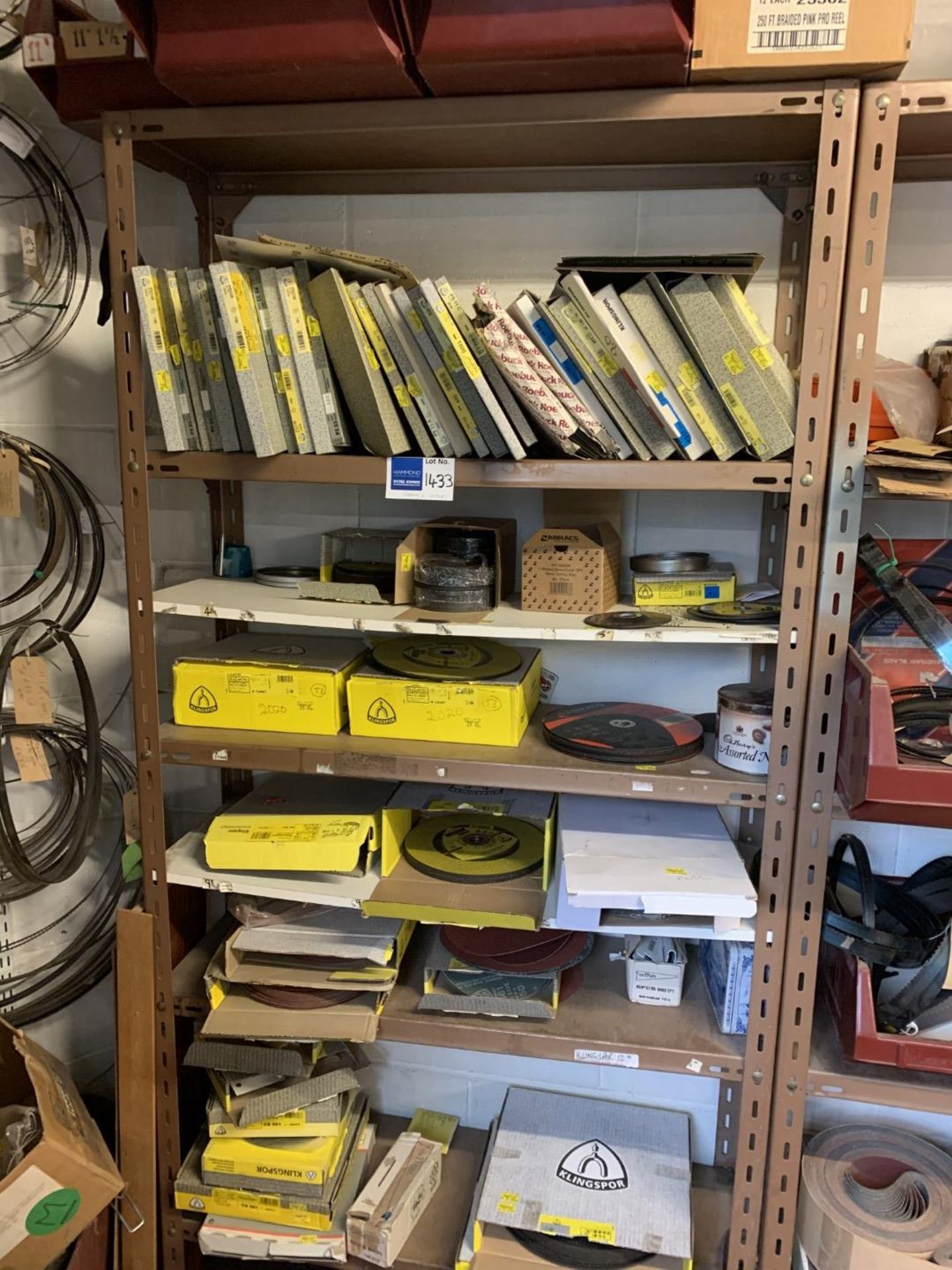 Metal shelves and contents including Klingspor abrasive disc and sand paper