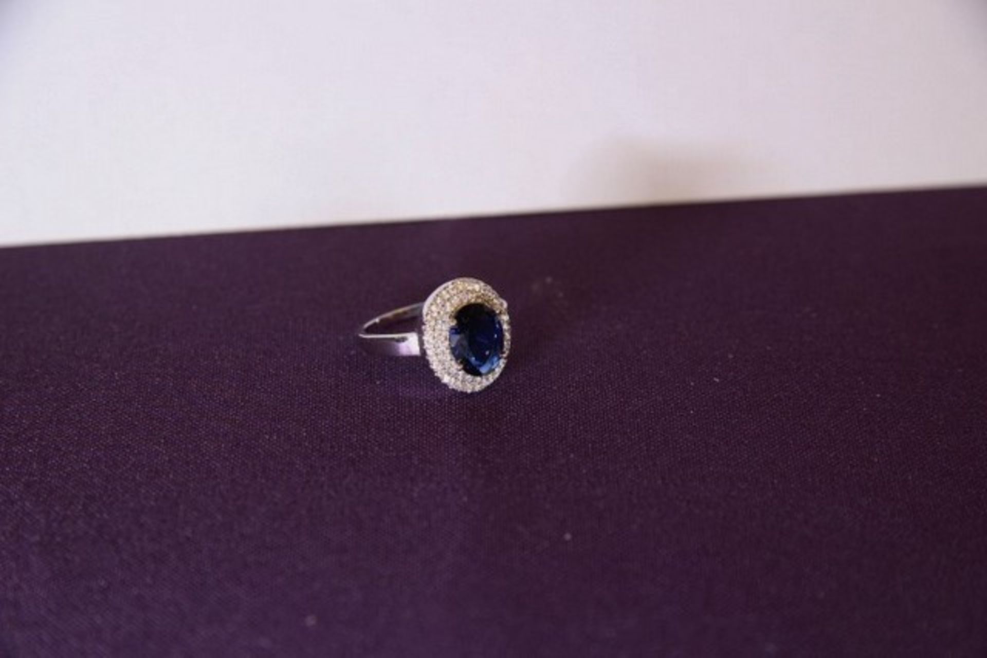 + VAT Brand New Platinum Plated Blue and White Stone Ring