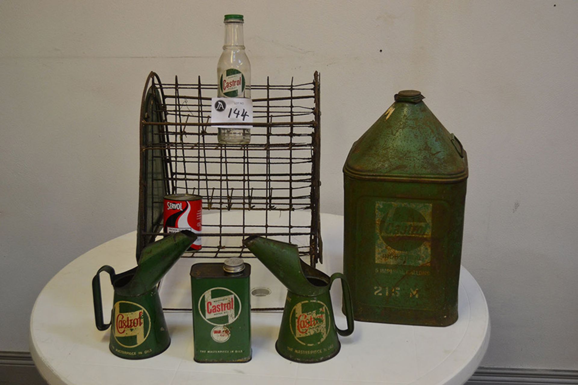 Selection of Castrol oil cans and sales rack