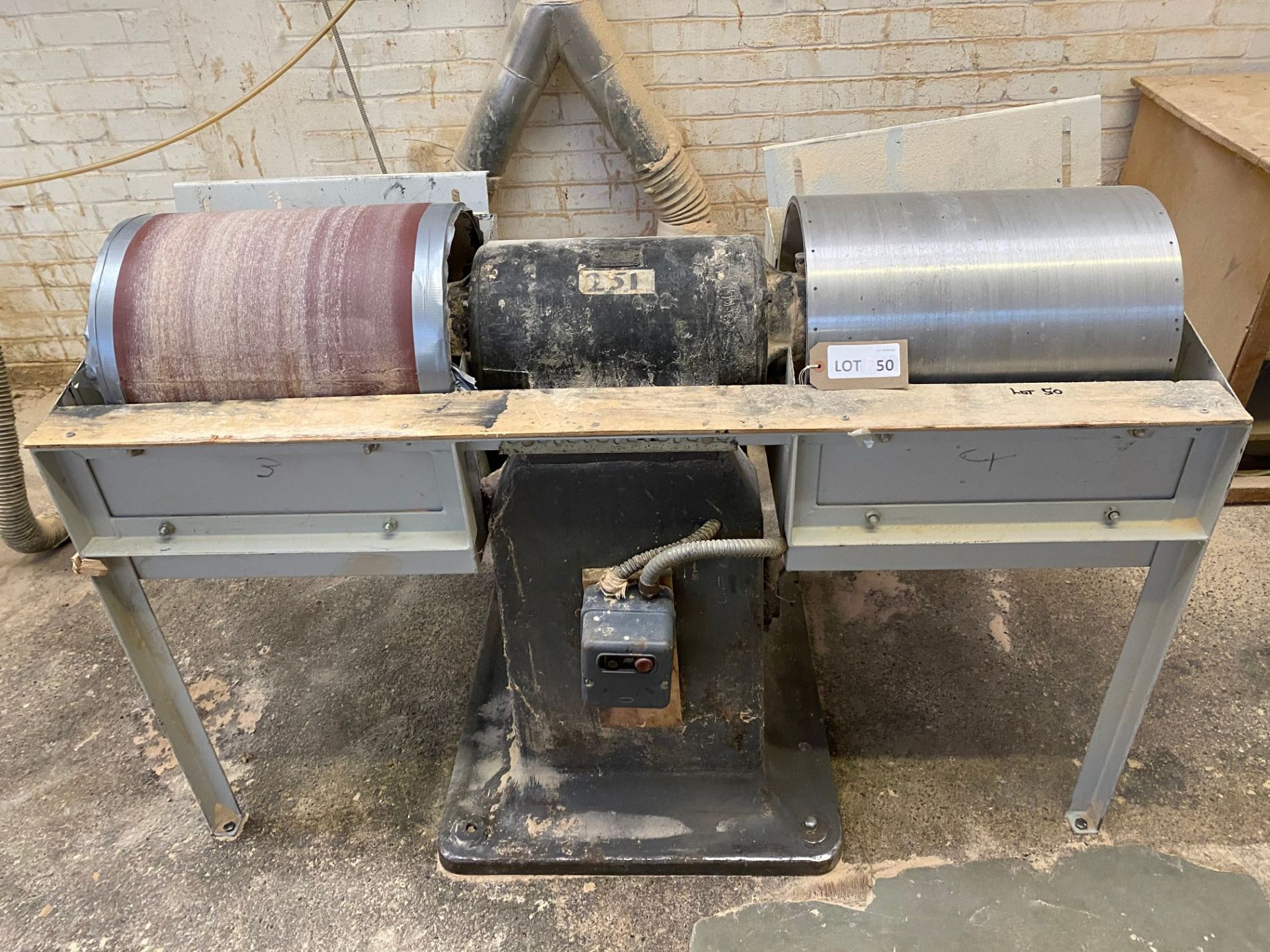 Unbadged twin-end linisher with two 18" x 14" hard drums