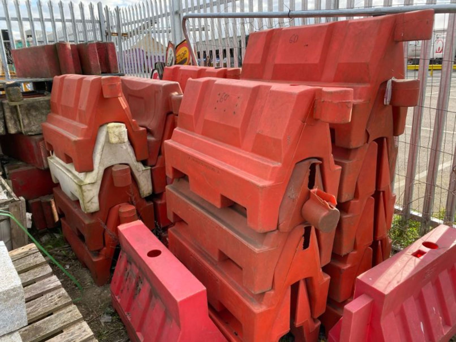 Qty various interlocking barrier blocks, as lotted
