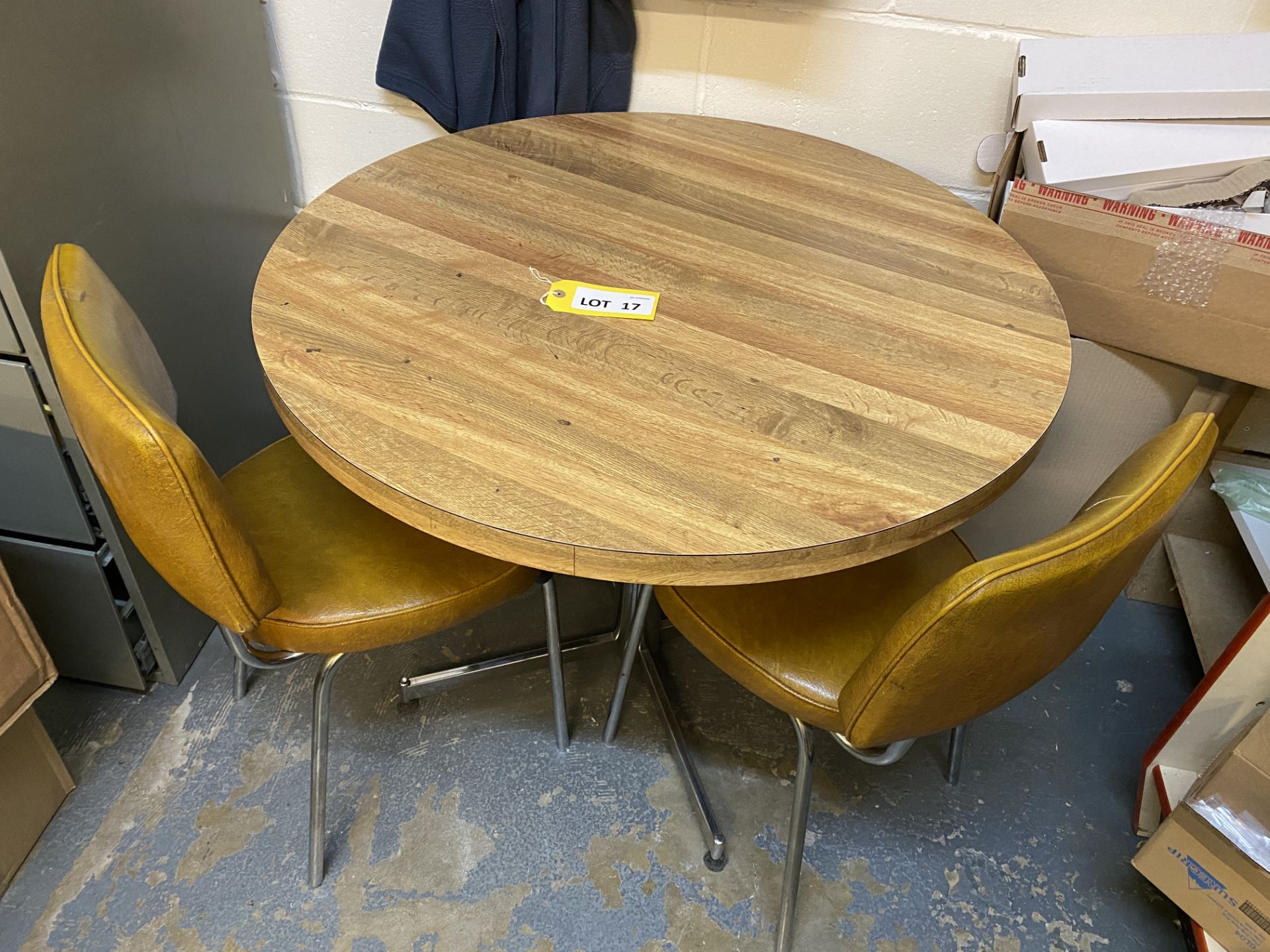 1.2m dia laminate table with two chairs, brown leather effect