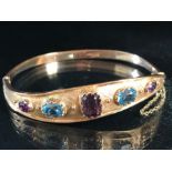 9ct Gold Bracelet set with bright Amethyst and Aqua Marine stones (total weight 18.5g)