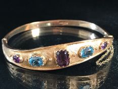 9ct Gold Bracelet set with bright Amethyst and Aqua Marine stones (total weight 18.5g)