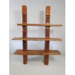 Hardwood shelving unit of rustic design