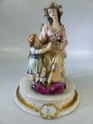 Tyche Tosca Capodimonte, figurine of a lady and child, letter "N" and crown to plinth and underside