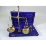 Brass cased weighing scales with weights