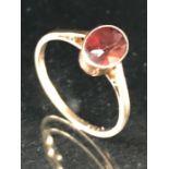 9ct Gold ring set with large Oval Garnet