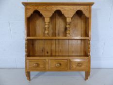 Pine kitchen wall-mounted shelving unit with three drawers