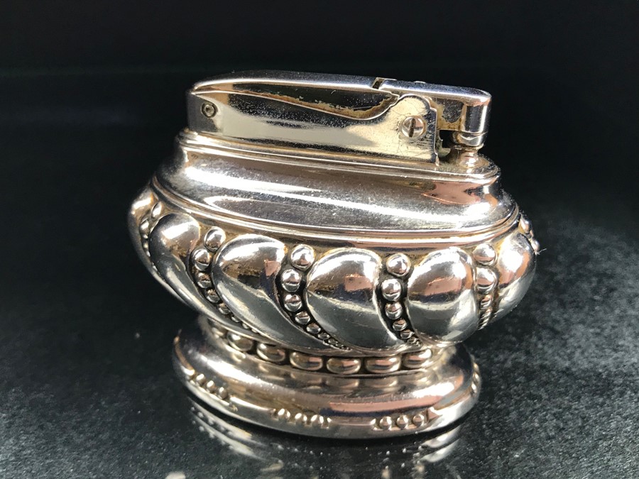 An early 20th century Ronson 'Crown' white metal table lighter, reg. no. 850881