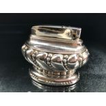 An early 20th century Ronson 'Crown' white metal table lighter, reg. no. 850881