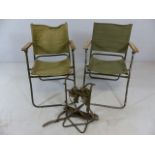 Two commando post folding chairs and a radio carrier