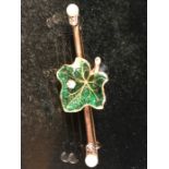 Gold (High Carat) Enamelled Maple Leaf set with small old mine cut diamond and set on a bar brooch