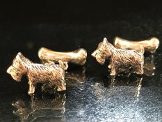 Pair of silver dog and bone cufflinks