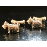 Pair of silver dog and bone cufflinks